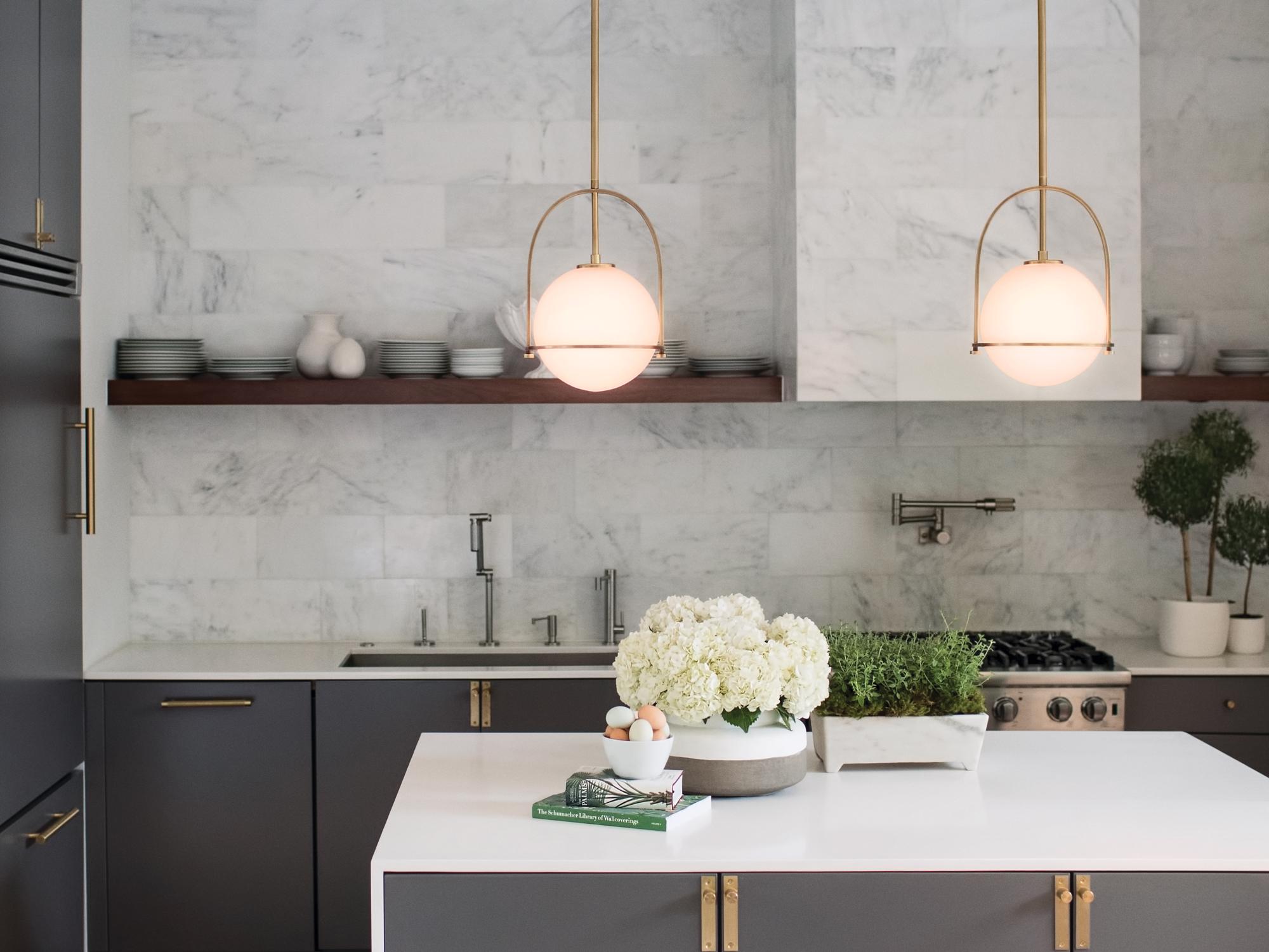 Lighting pendants from the Mars Electric Lighting Showroom in a home kitchen
